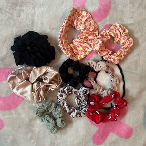 Assortment of scrunchies: UO, Brandy Melville, Sanrio Hello Kitty, Amazon
